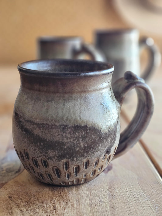 Carved Rustic Pottery Mug in earthy tones