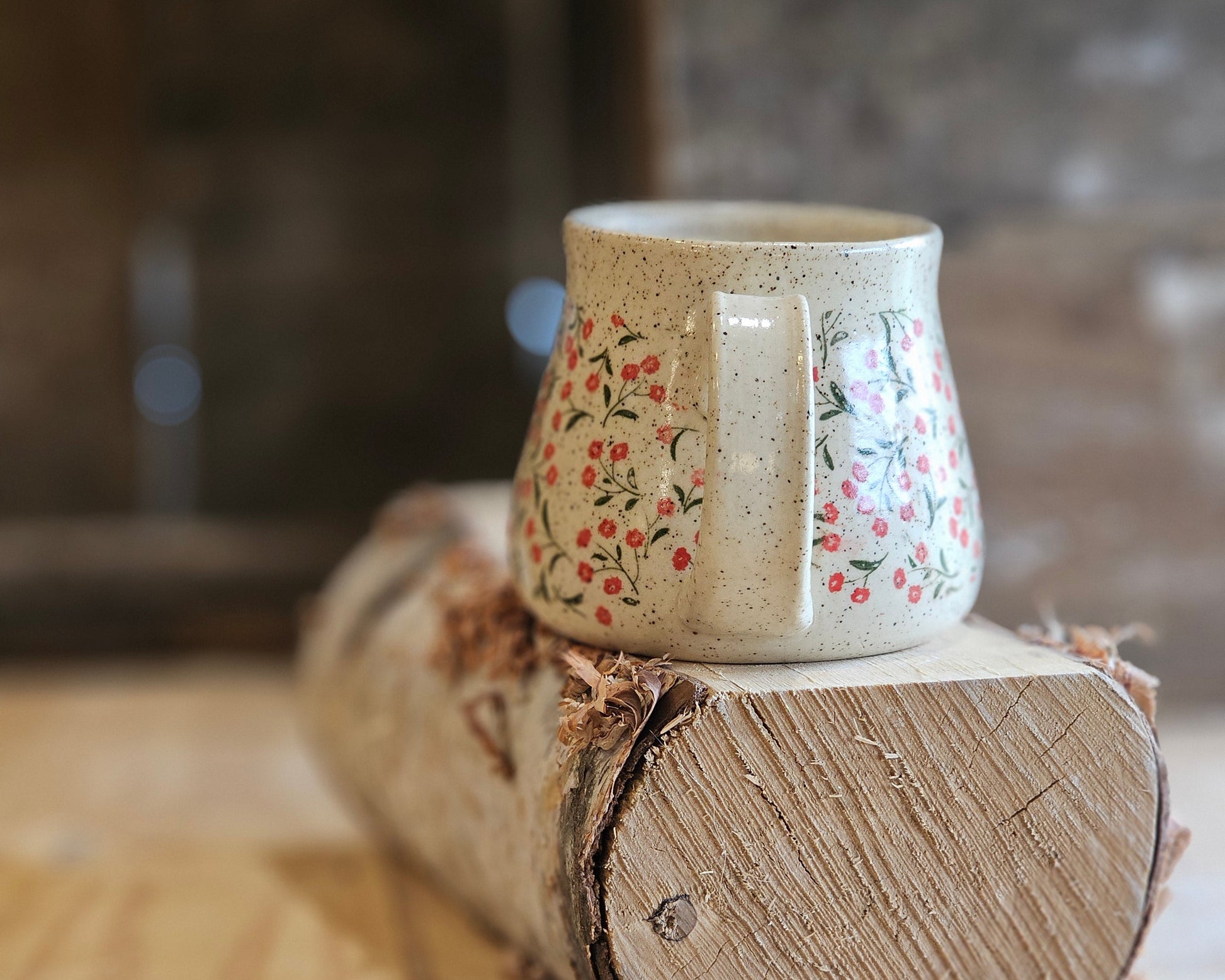 full bellied wheel thrown pottery mug, tiny red flower around,  ceramic gift, made in northern Idaho
